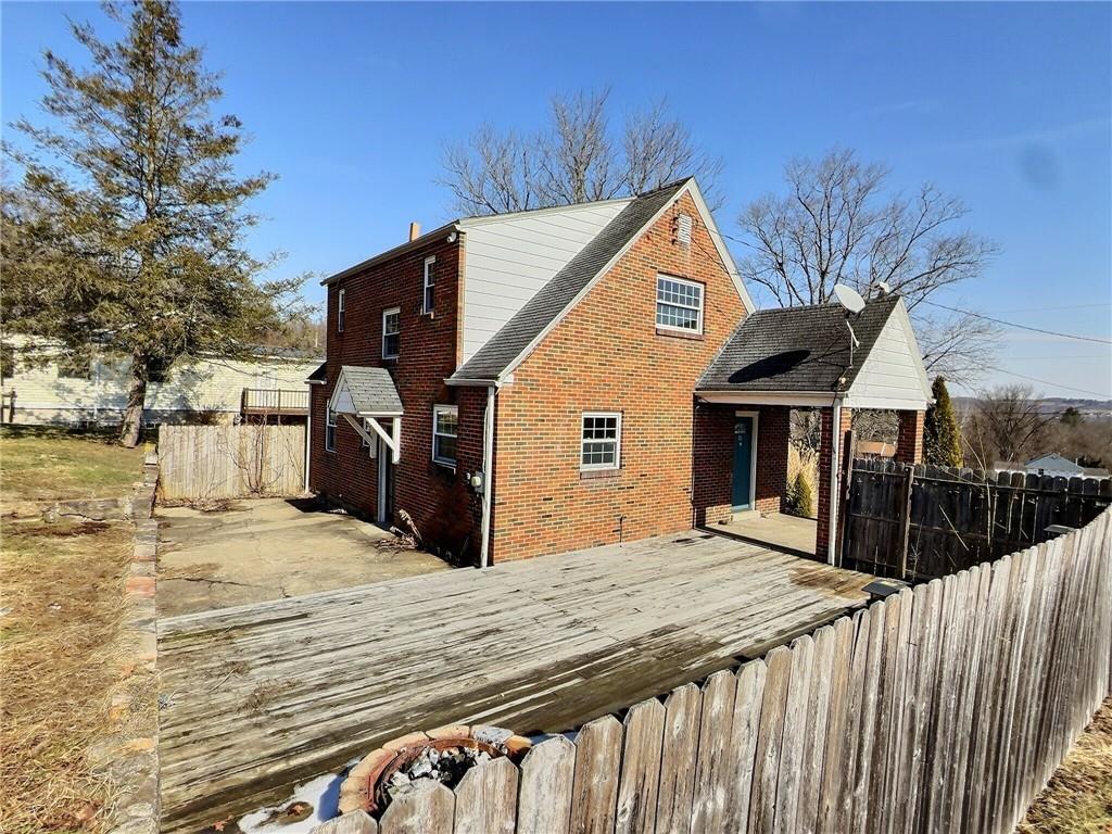41 Bethlehem Street Fredericktown, PA 15333 - Photo 29 of 33 a view of a house with a wooden fence