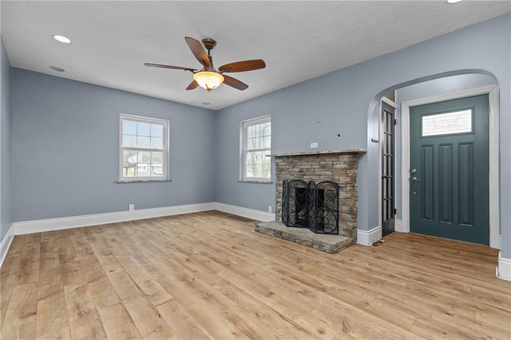 41 Bethlehem Street Fredericktown, PA 15333 - Photo 5 of 33 a view of an empty room with window and fireplace