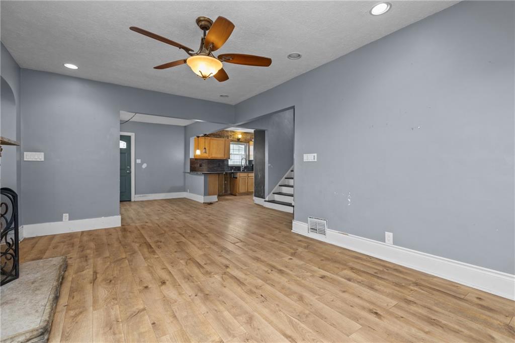 41 Bethlehem Street Fredericktown, PA 15333 - Photo 9 of 33 a view of empty room with wooden floor