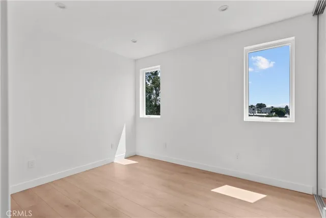 a view of cabinets and wooden floor