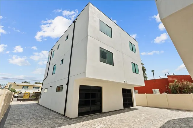 a view of a house with a street