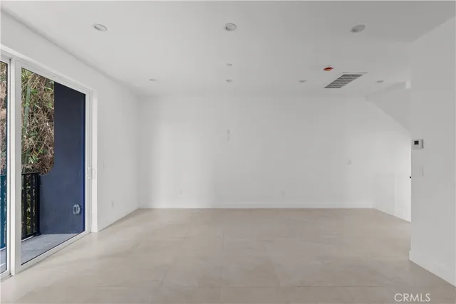 a view of a hallway with closet