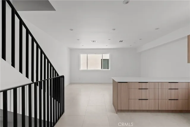 a view of a balcony with wooden fence and floor
