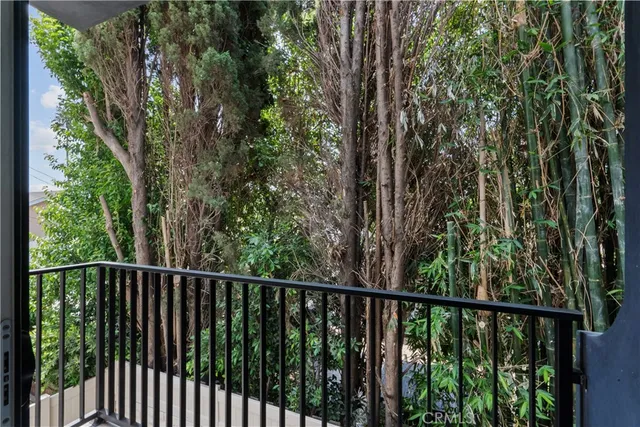 a kitchen with a stove a refrigerator and a sink