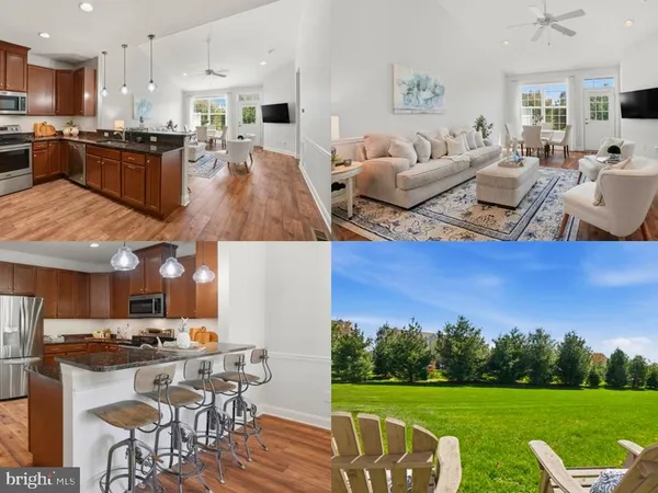 a living room with lots of furniture and kitchen view