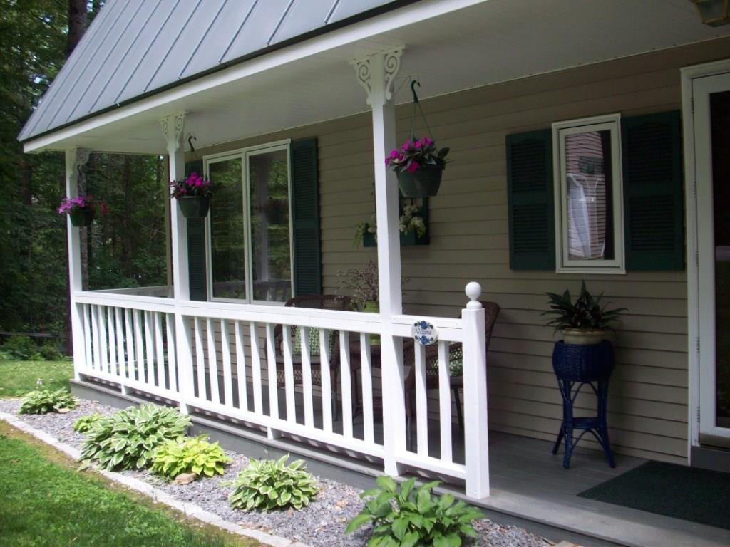 1717 Embden Pond Road Embden, ME 04958 - Photo 23 of 42 Farmers porch