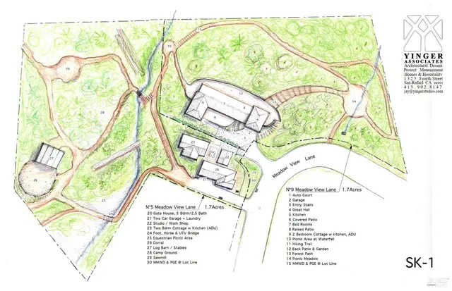 an aerial view of mountains residential house and green space