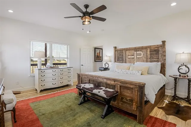 a bedroom with a bed and a cabinets