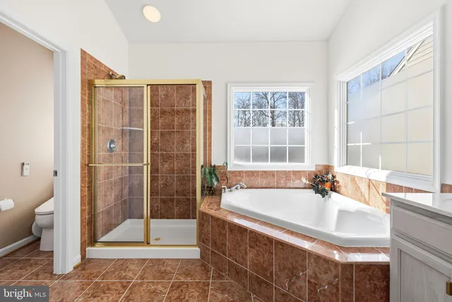 a room with pool table and flat screen tv