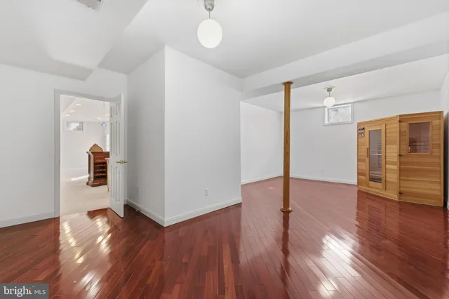 a workspace with furniture and wooden floor