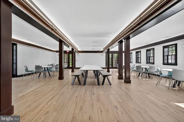 a view of backyard with wooden fence