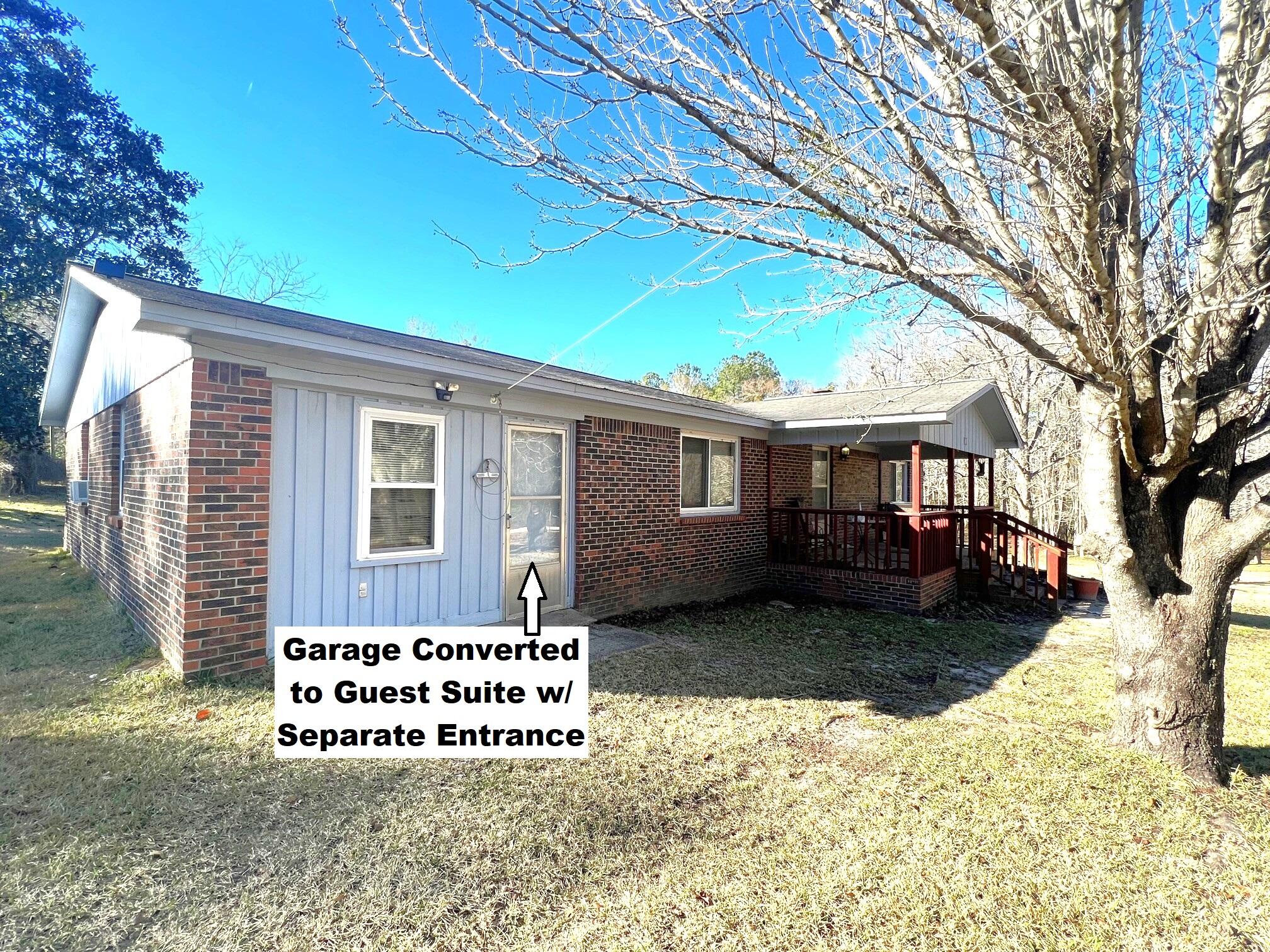 401 Mims Road DeFuniak Springs, FL 32433 - Photo 12 of 78 a view of a house with a yard