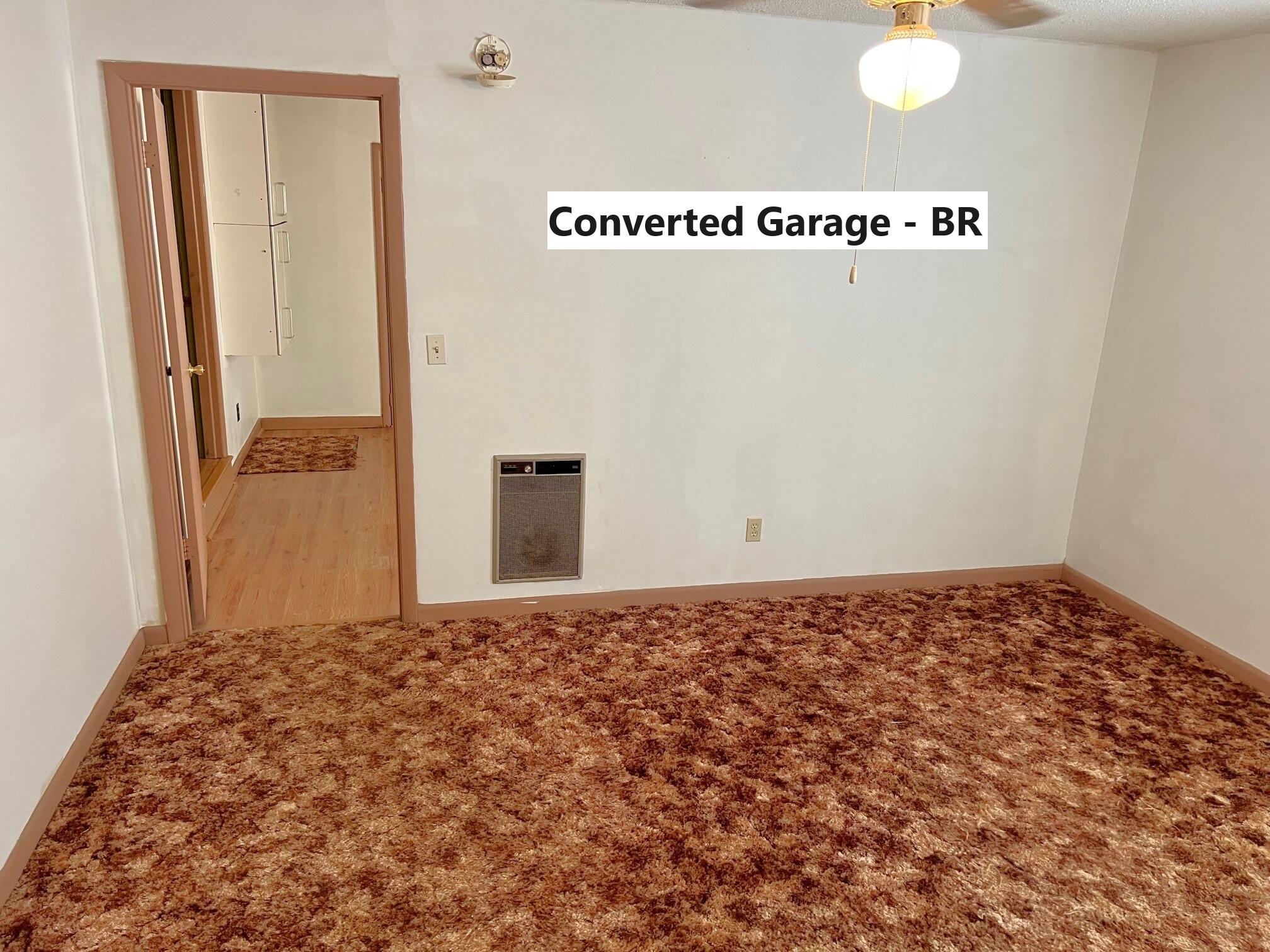 401 Mims Road DeFuniak Springs, FL 32433 - Photo 27 of 78 a view of a big room with closet and wooden floor