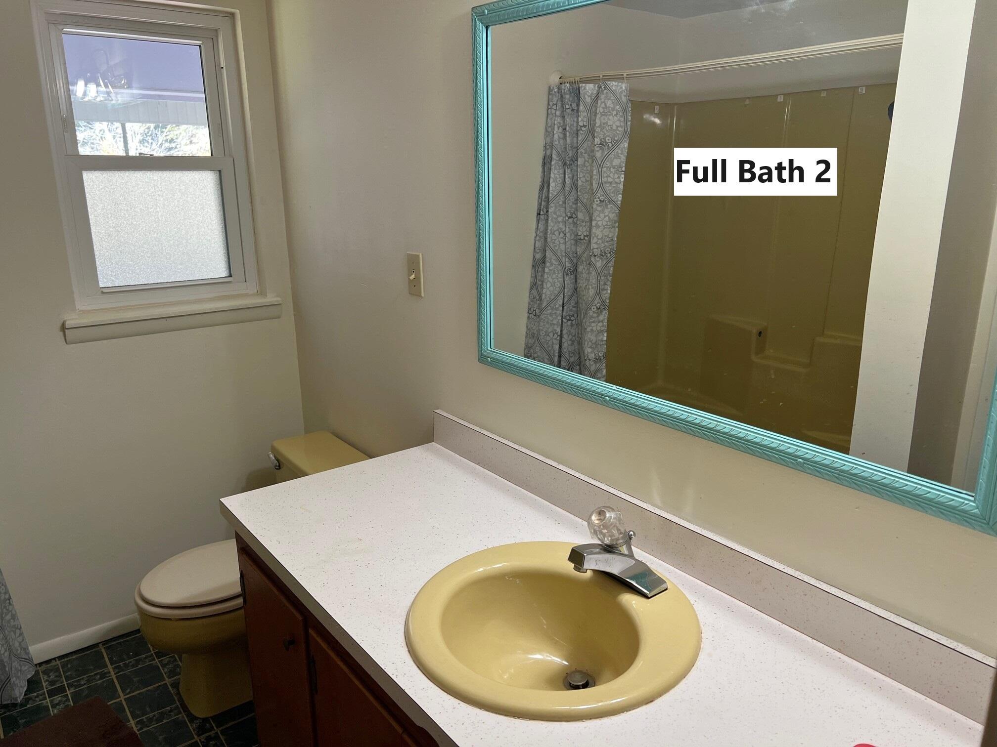 401 Mims Road DeFuniak Springs, FL 32433 - Photo 37 of 78 a bathroom with a toilet and a sink