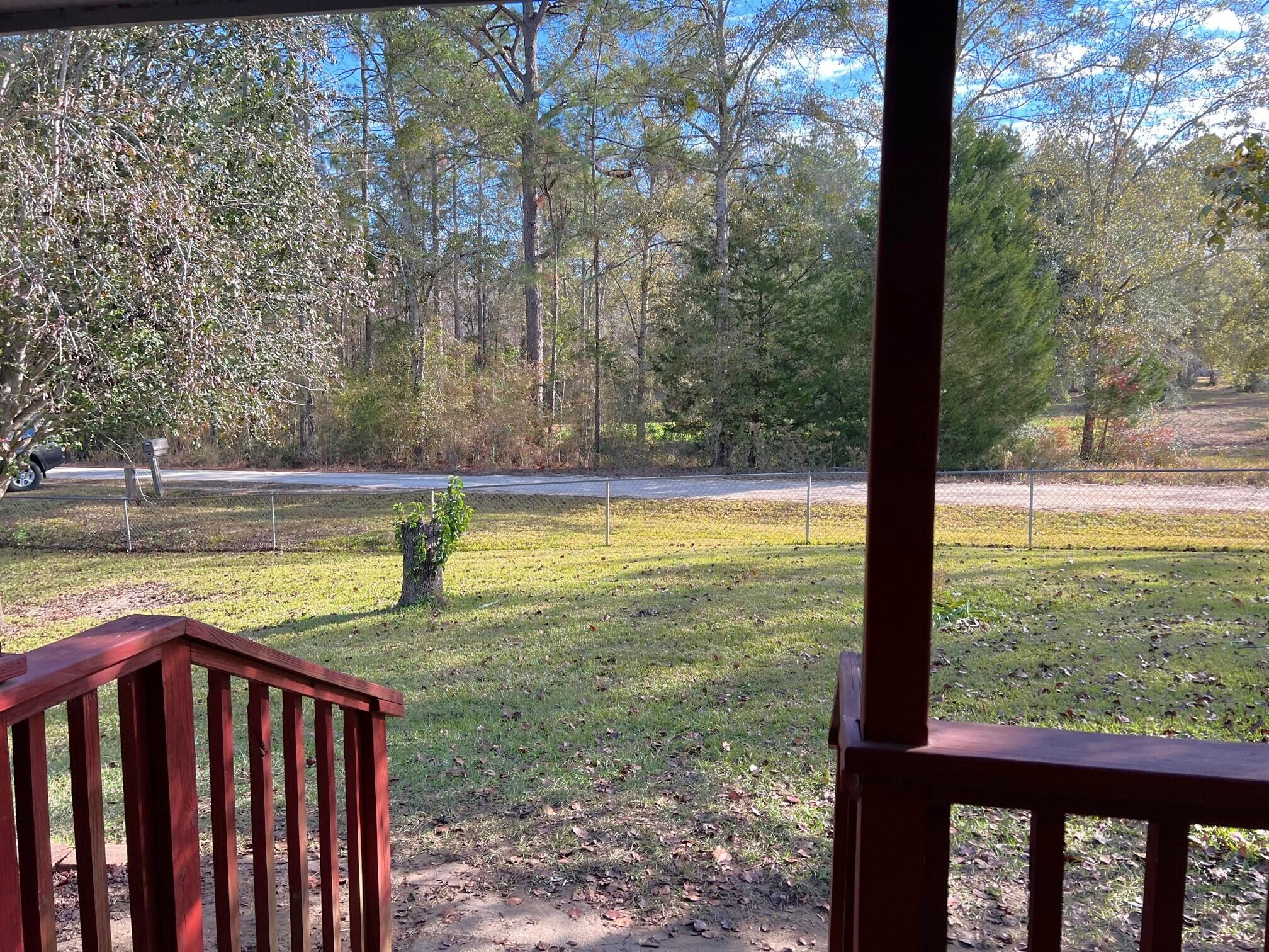 401 Mims Road DeFuniak Springs, FL 32433 - Photo 42 of 78 a view of a swimming pool from a balcony