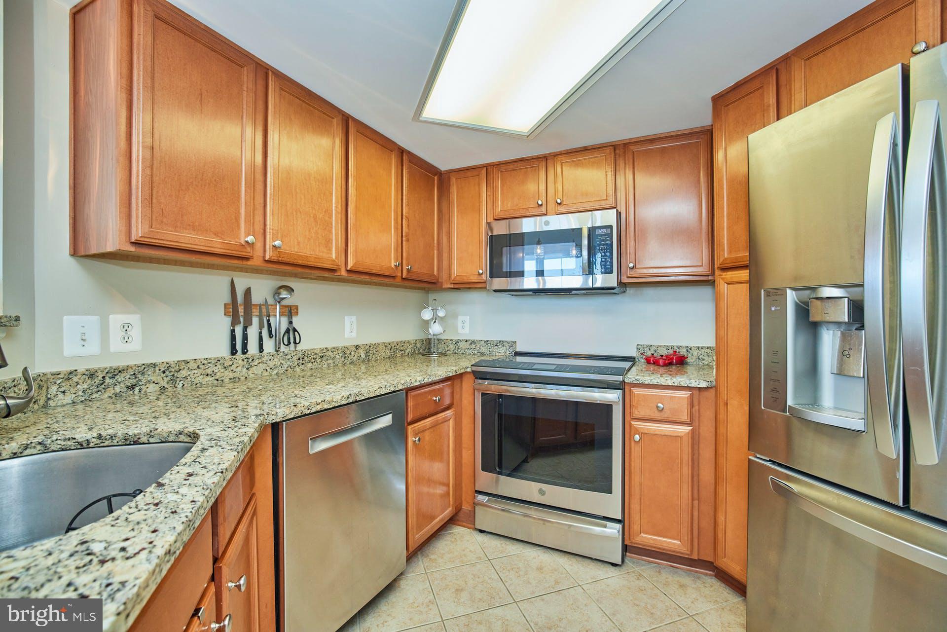 11800 Sunset Hills Road, Unit 521 Reston, VA 20190 - Photo 14 of 34 French door fridge and Bosch dishwasher