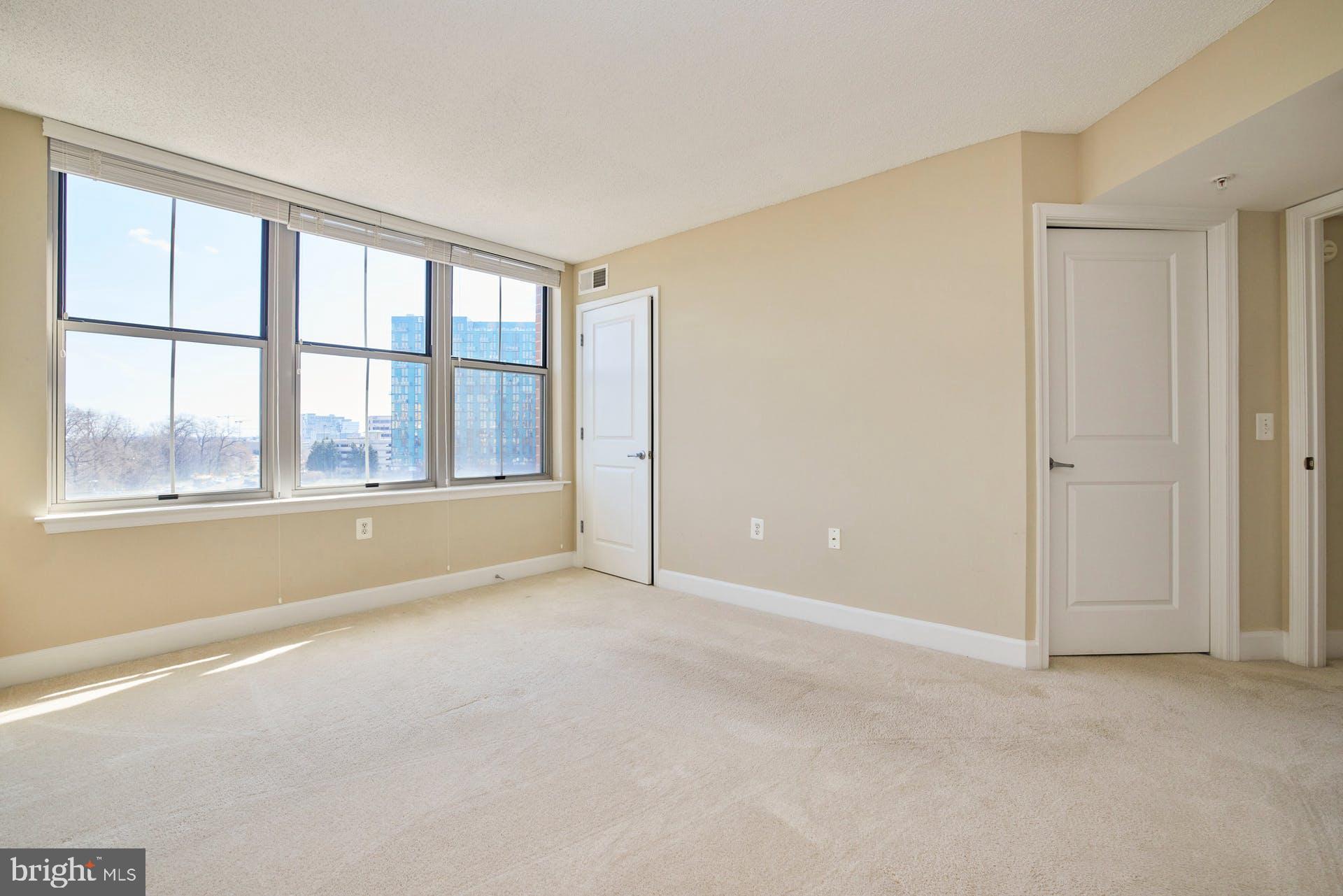11800 Sunset Hills Road, Unit 521 Reston, VA 20190 - Photo 20 of 34 Large and light filled second bedroom