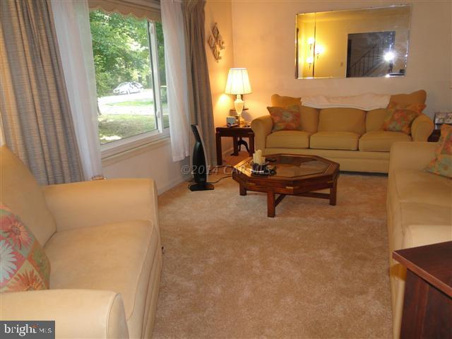 172 Windjammer Road Ocean Pines, MD 21811 - Photo 2 of 24 a living room with furniture and a large window