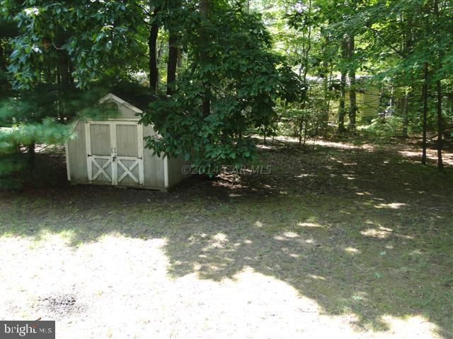 172 Windjammer Road Ocean Pines, MD 21811 - Photo 12 of 24 a view of house with yard