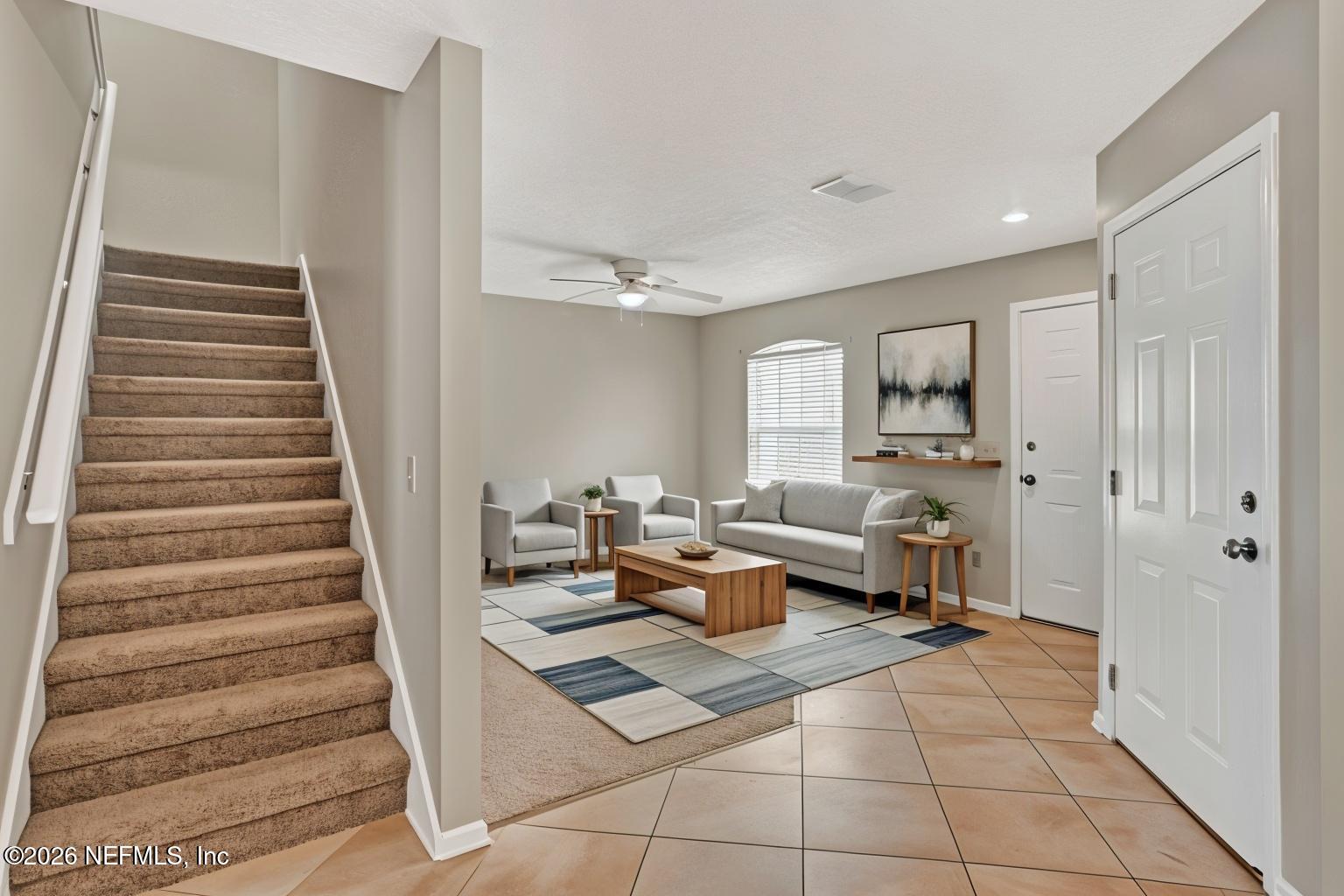 900 Country Bridge Road, Unit 3 St. Johns, FL 32259 - Photo 2 of 18 a living room with furniture and wooden floor