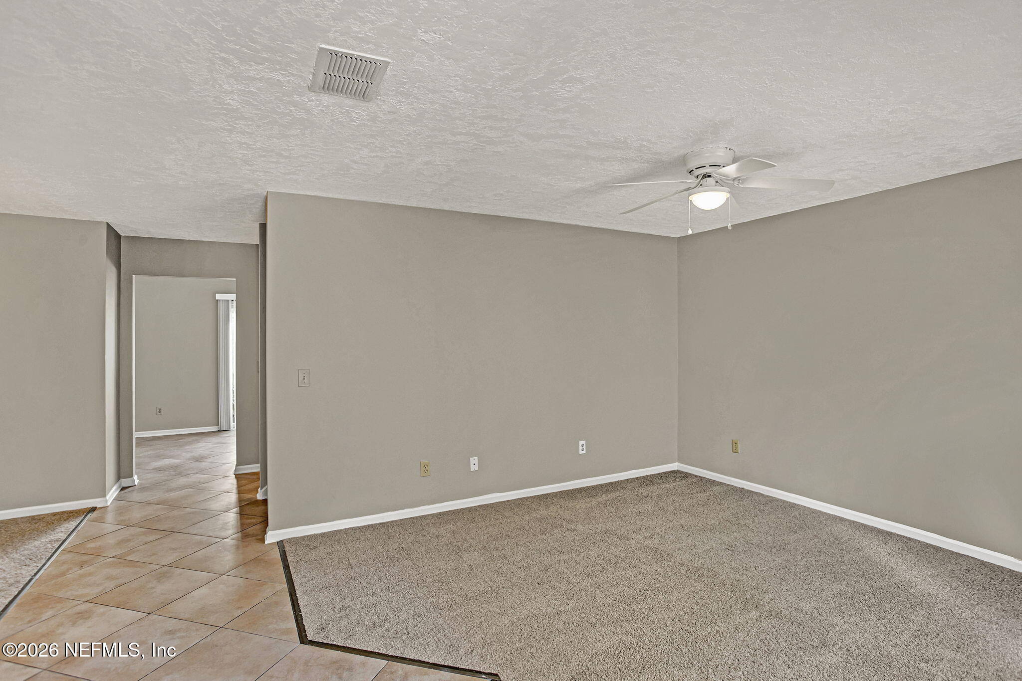 900 Country Bridge Road, Unit 3 St. Johns, FL 32259 - Photo 3 of 18 Living Room featuring Staircase, Carp...