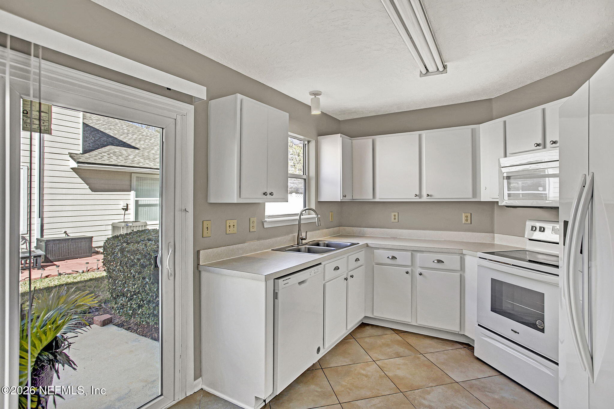 900 Country Bridge Road, Unit 3 St. Johns, FL 32259 - Photo 6 of 18 Kitchen featuring White cabinets, Whi...
