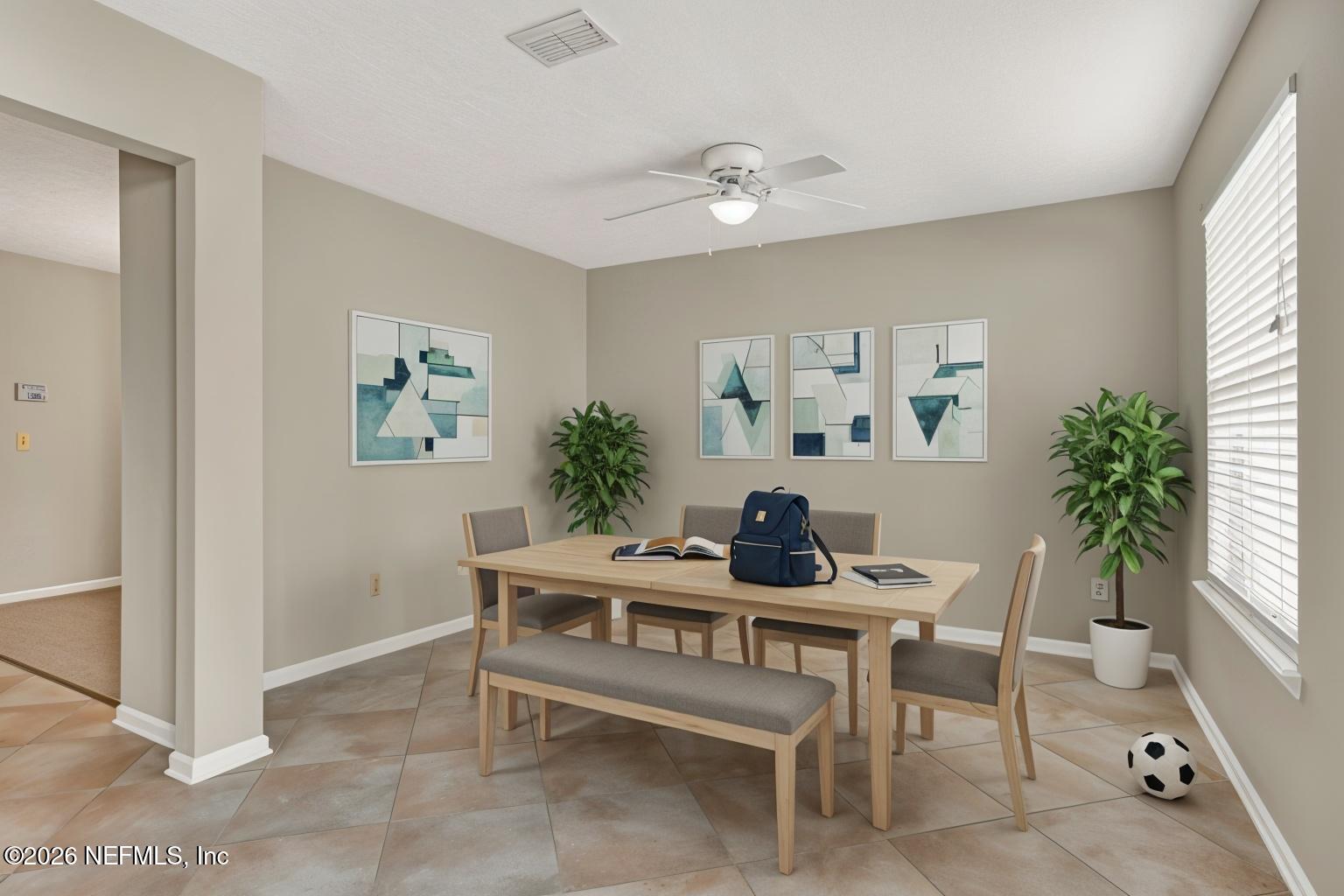 900 Country Bridge Road, Unit 3 St. Johns, FL 32259 - Photo 7 of 18 a dining room with furniture and window