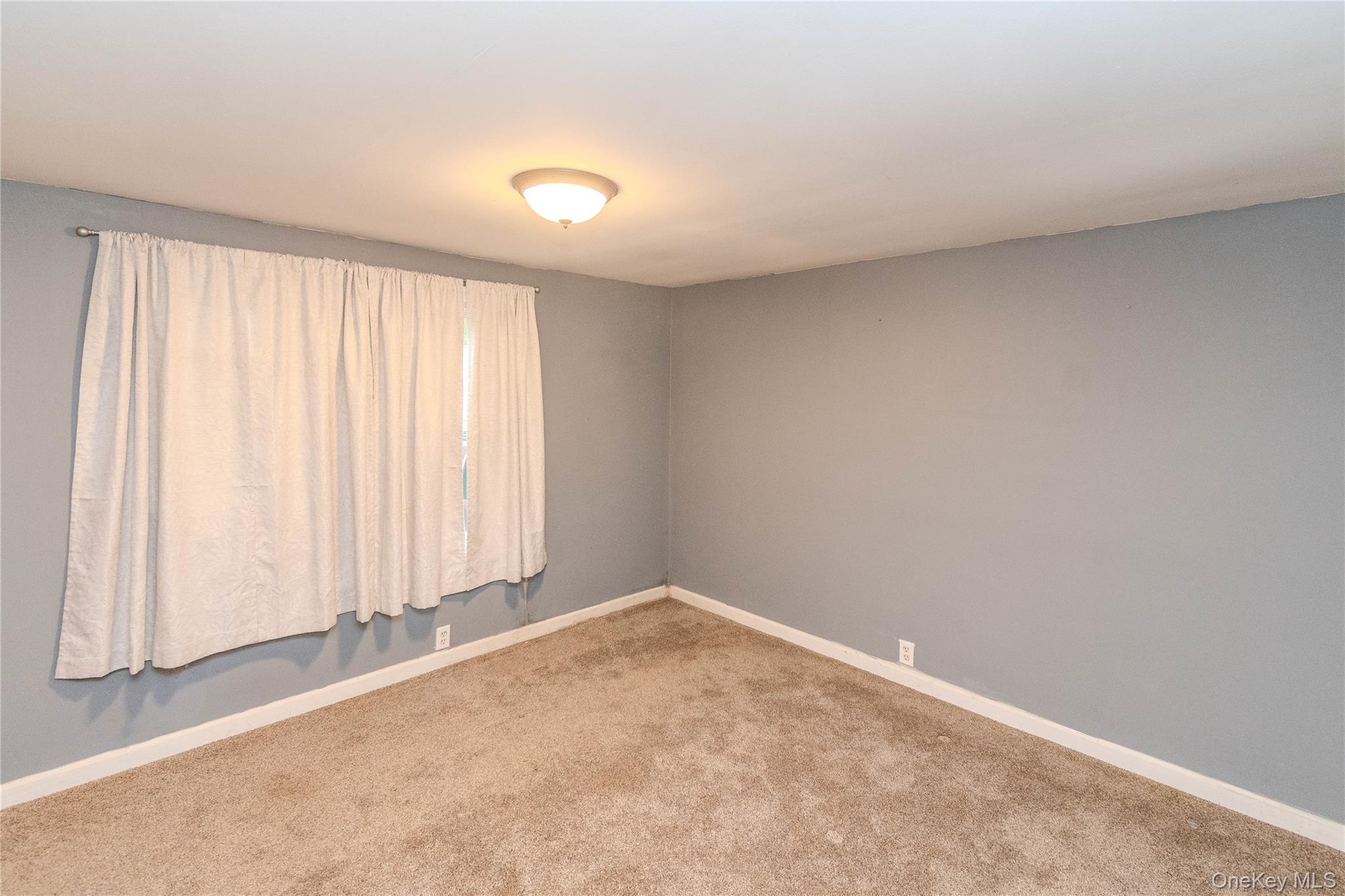 198 Sinpatch Road, Unit 16 Wassaic, NY 12592 - Photo 11 of 26 Recessed ceiling light fixture, neutral wall color, and carpeted flooring
