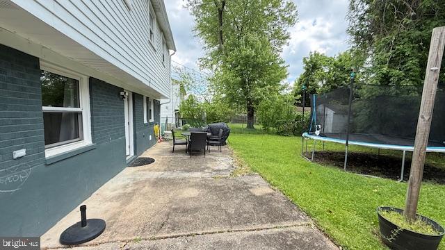 7907 Subet Road Windsor Mill, MD 21244 - Photo 31 of 31 a view of backyard with a garden and entertaining space
