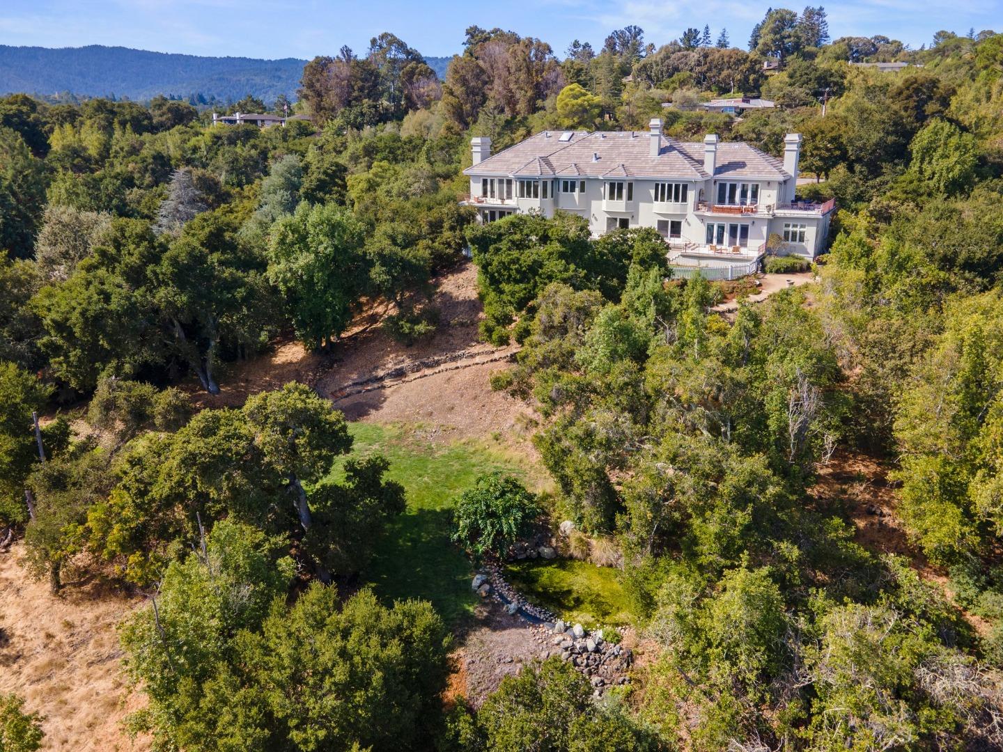 7 Oak Haven Way Woodside, CA 94062 - Photo 1 of 1 a view of a house with a yard and garden