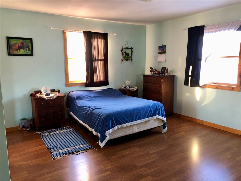 1683 Historical Road Northern Cambria, PA 15714 - Photo 5 of 17 a bedroom with a bed and wooden floor