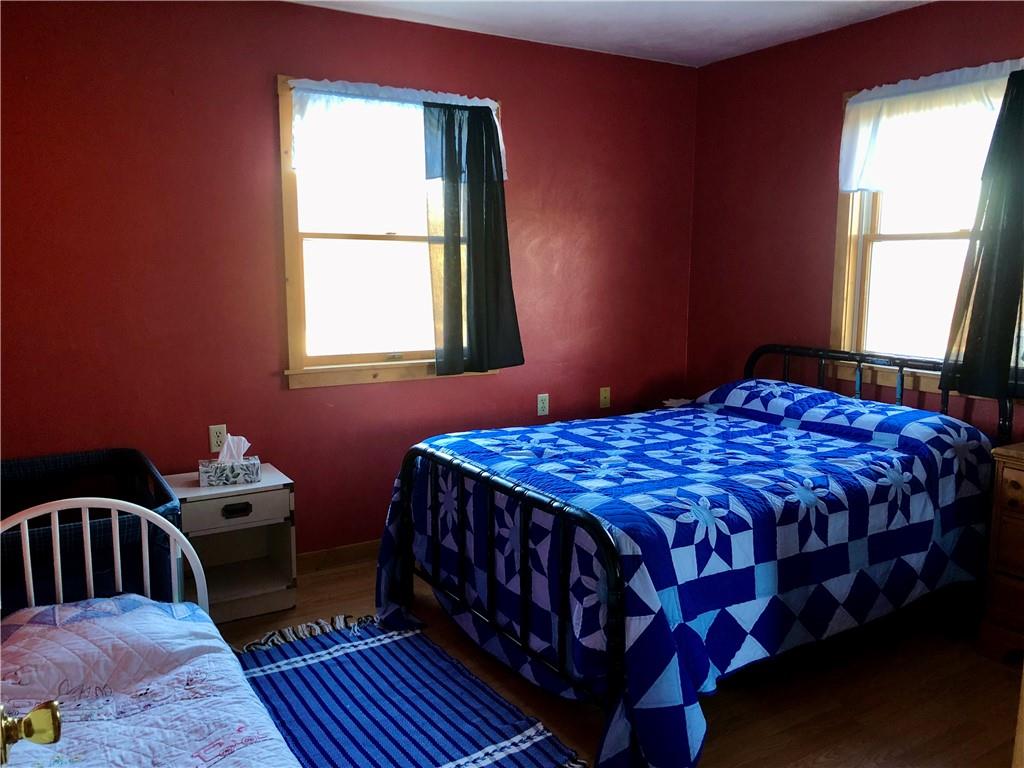 1683 Historical Road Northern Cambria, PA 15714 - Photo 8 of 17 a bedroom with a bed and a window