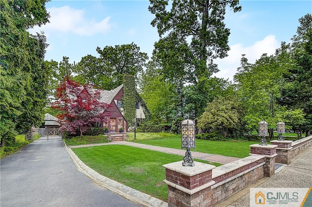 270 Middlesex Avenue Metuchen, NJ 08840 - Photo 2 of 54 a garden view with a fountain