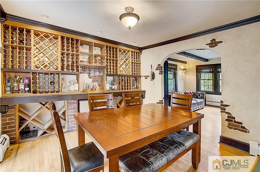 270 Middlesex Avenue Metuchen, NJ 08840 - Photo 13 of 54 a dining room with furniture and a floor to ceiling window