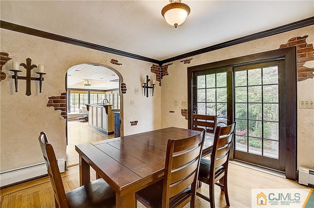 270 Middlesex Avenue Metuchen, NJ 08840 - Photo 14 of 54 a view of a dining room with furniture and a large window