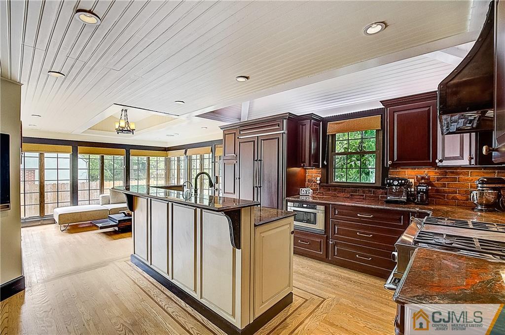 270 Middlesex Avenue Metuchen, NJ 08840 - Photo 16 of 54 a open kitchen with stainless steel appliances granite countertop a stove and a refrigerator