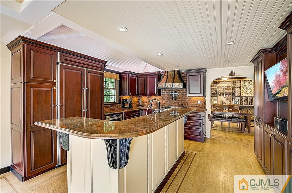 270 Middlesex Avenue Metuchen, NJ 08840 - Photo 21 of 54 a kitchen with stainless steel appliances granite countertop a sink stove and refrigerator