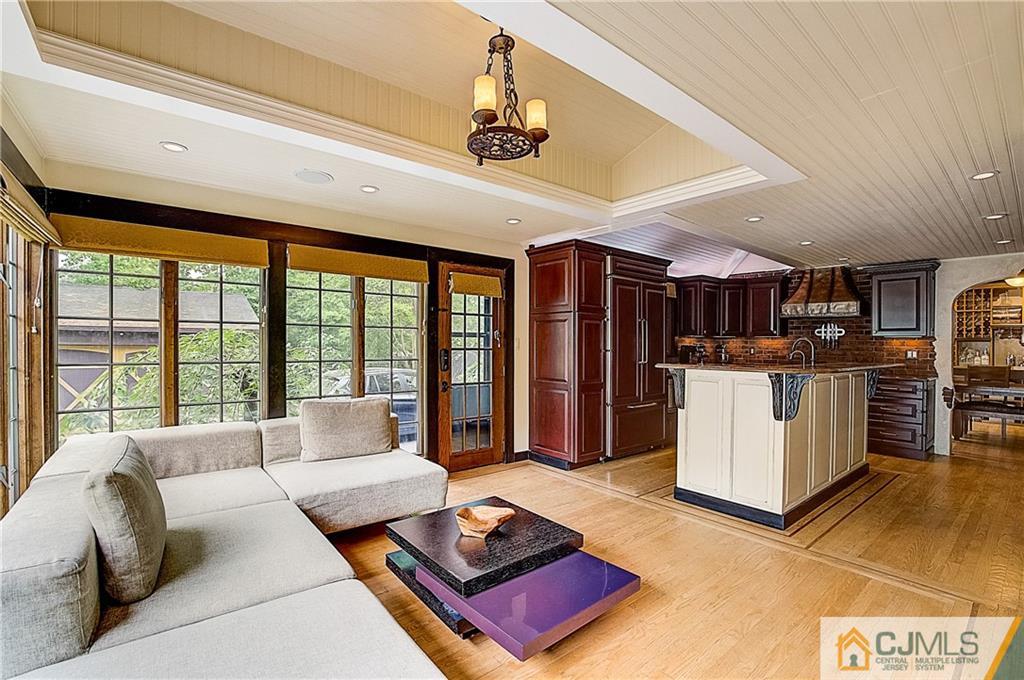 270 Middlesex Avenue Metuchen, NJ 08840 - Photo 24 of 54 a living room with furniture kitchen view and large windows