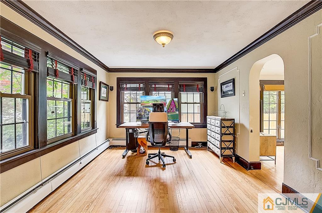 270 Middlesex Avenue Metuchen, NJ 08840 - Photo 25 of 54 a living room with furniture and a large window