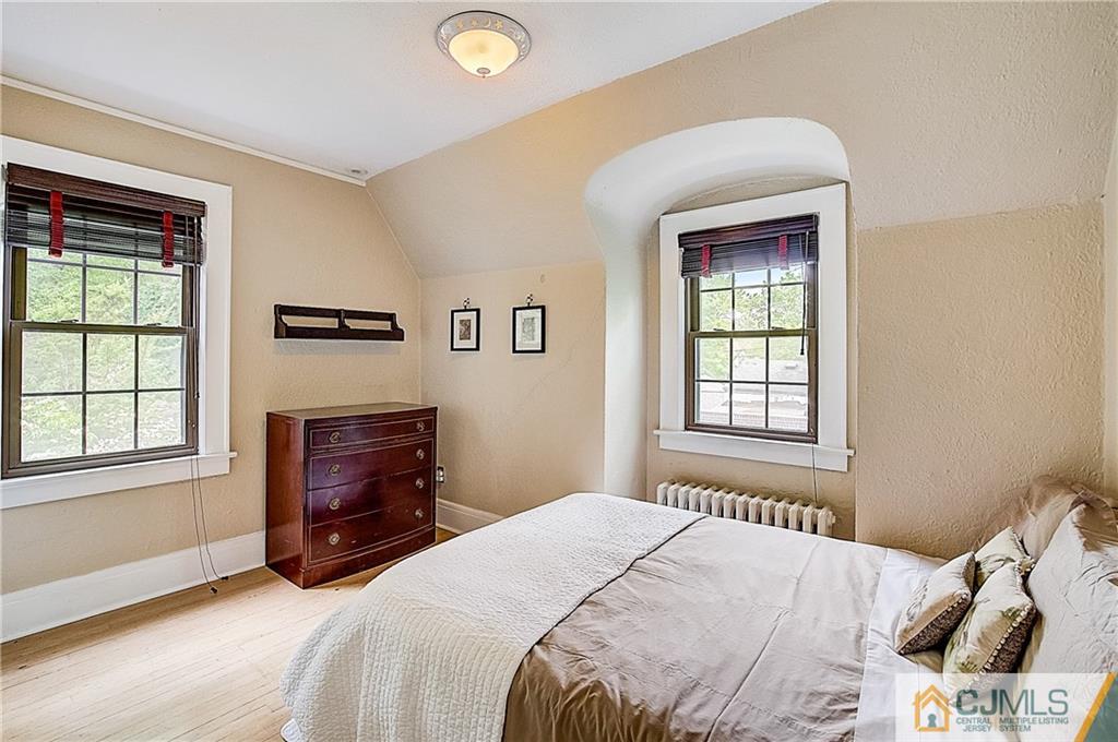 270 Middlesex Avenue Metuchen, NJ 08840 - Photo 30 of 54 a bedroom with a bed and a window