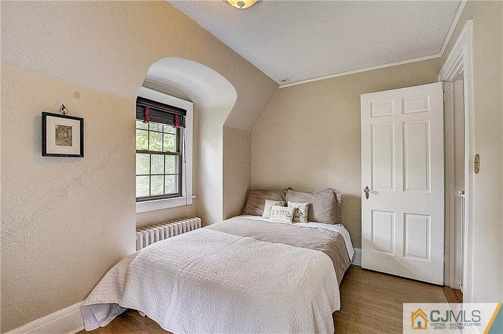 270 Middlesex Avenue Metuchen, NJ 08840 - Photo 31 of 54 a bedroom with a bed and a window