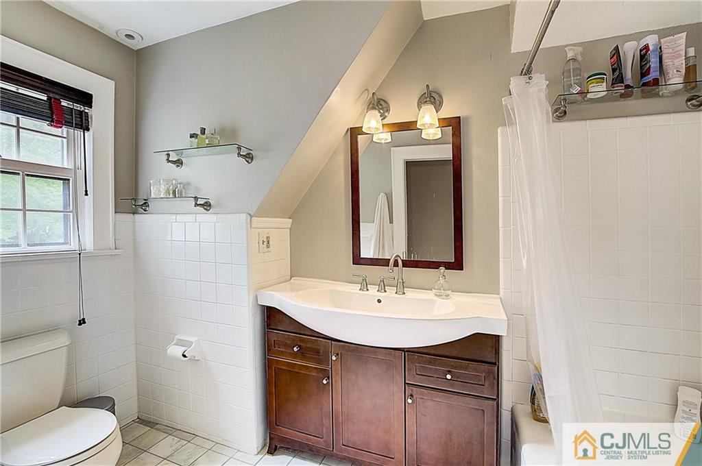 270 Middlesex Avenue Metuchen, NJ 08840 - Photo 33 of 54 a bathroom with a sink toilet and shower