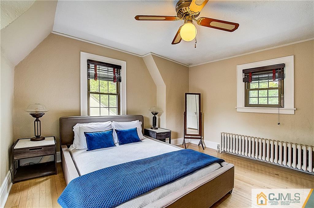 270 Middlesex Avenue Metuchen, NJ 08840 - Photo 36 of 54 a bedroom with a bed and a window