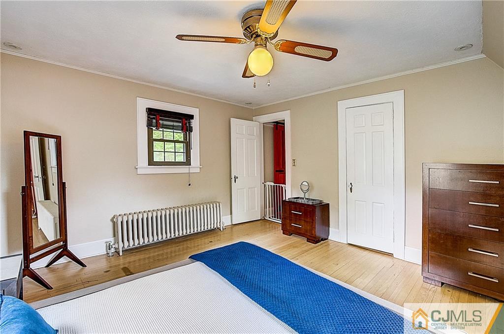 270 Middlesex Avenue Metuchen, NJ 08840 - Photo 37 of 54 a bedroom with furniture and a window