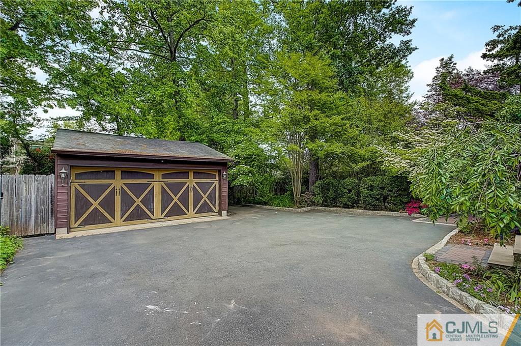 270 Middlesex Avenue Metuchen, NJ 08840 - Photo 39 of 54 a wooden house with trees in front of it