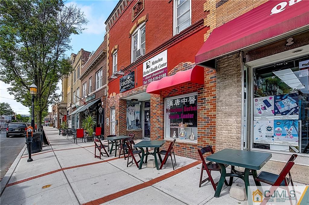 270 Middlesex Avenue Metuchen, NJ 08840 - Photo 50 of 54 a view of a cafe with a couple of people seating on table and chairs