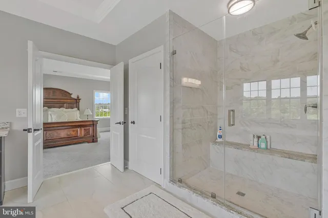 a view of a large body of water with a building in the background