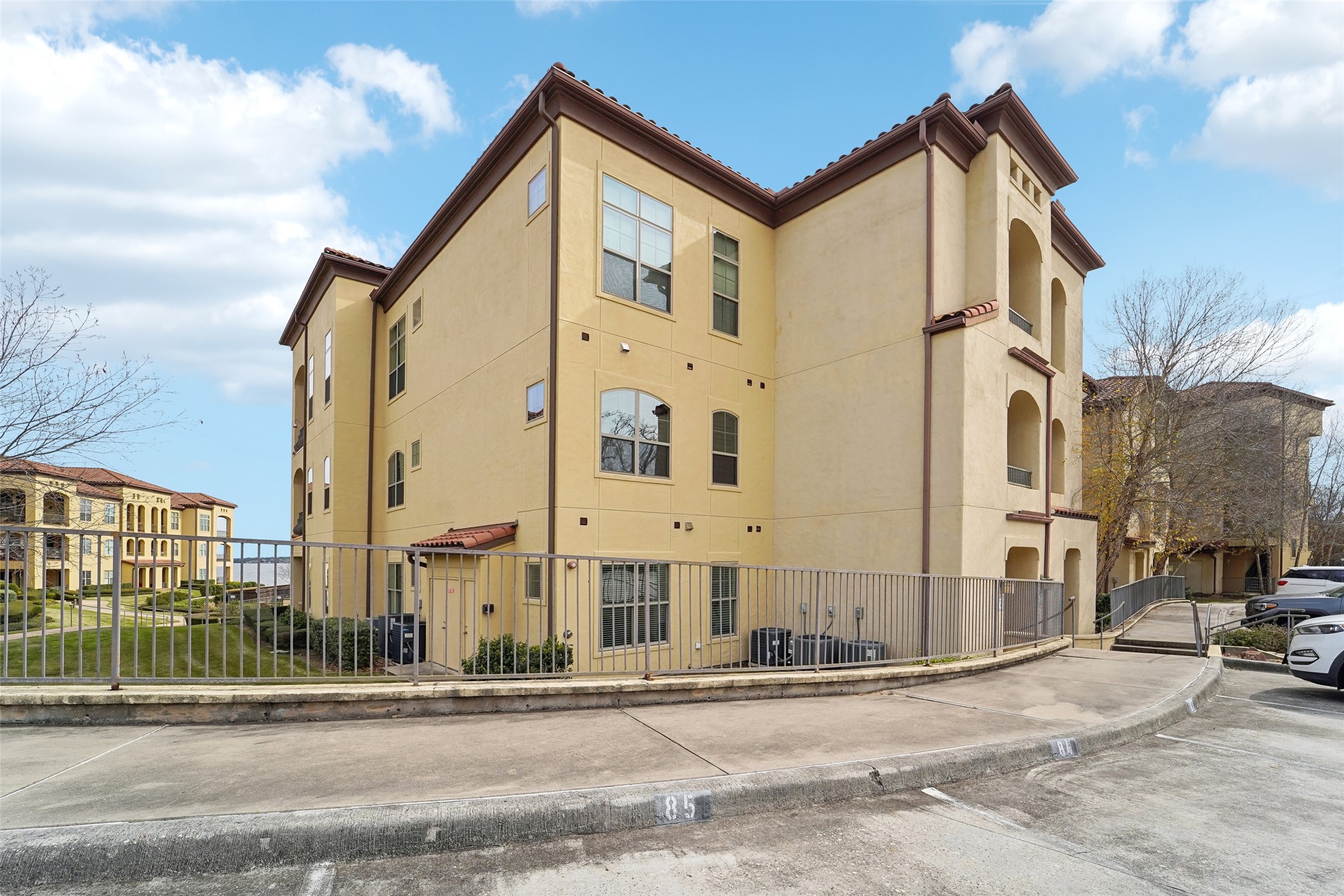 17040 West Fm 1097 Road, Unit 4101 Montgomery, TX 77356 - Photo 27 of 29 a view of a street with a building in the background