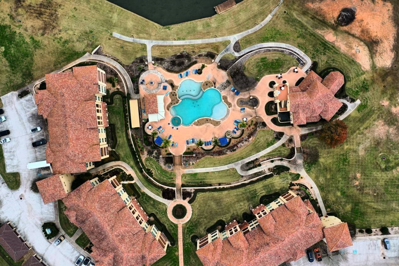 17040 West Fm 1097 Road, Unit 4101 Montgomery, TX 77356 - Photo 29 of 29 an aerial view of a house with a swimming pool