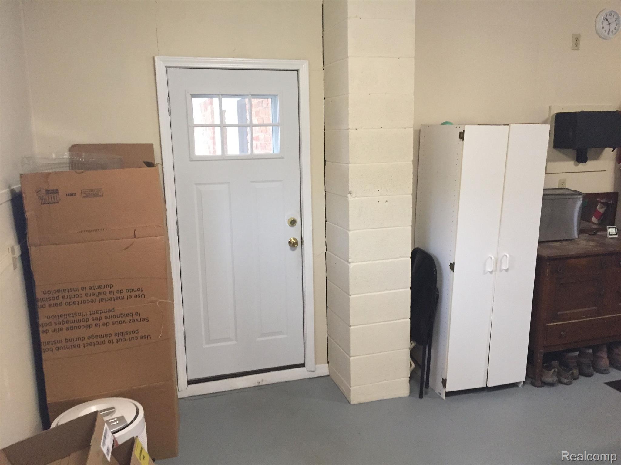 5657 Cribbins Road Avoca, MI 48006 - Photo 50 of 66 Storage/workshop with door to rear porch